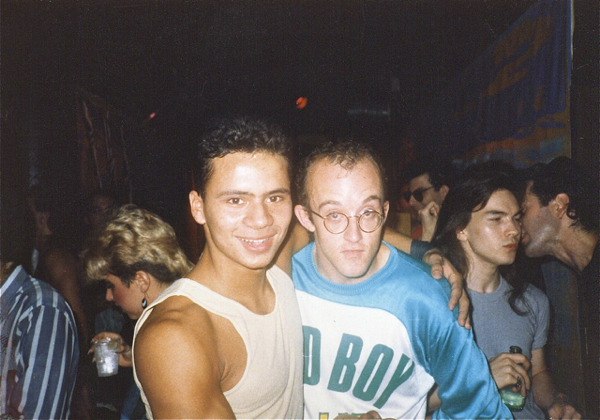 Keith Haring and go-go boy at Danceteria.  (1985)